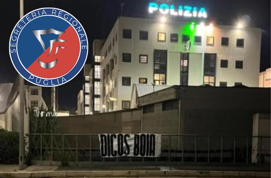 La scritta contro la Digos davanti alla Questura di Brindisi