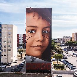 Jorit, dal murale a Taranto all'abbraccio con Putin