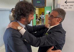 Pinuccio Fazio riabbraccia il poliziotto che arrestò l'assassino di suo figlio