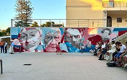 I volti del pensiero critico colorano Studium 2000: murales d'autore per celebrare le scienze sociali
