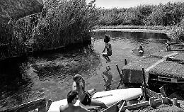 Un tuffo nelle acque del Tara, dove si racconta la storia di Taranto. Tutte le foto